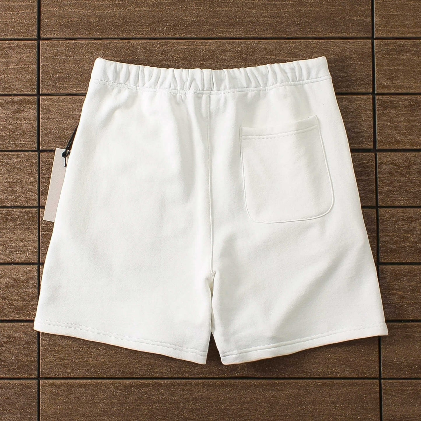 "essence" shorts white
